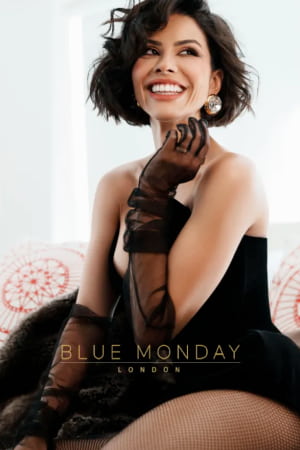 Pretty Latin girl with cropped black hair smiling brightly