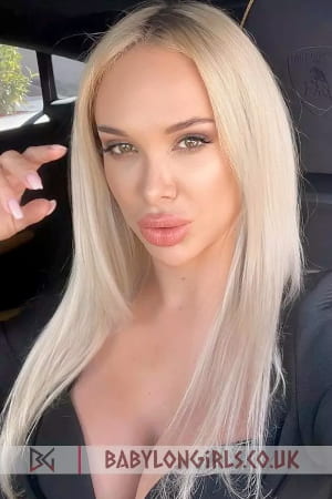 Close up of a sexy Russian blonde with pouting red lips