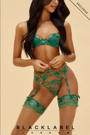 Sexy slim Indian girl in green luxury underwear