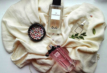 Display of 3 bottles of luxury perfume